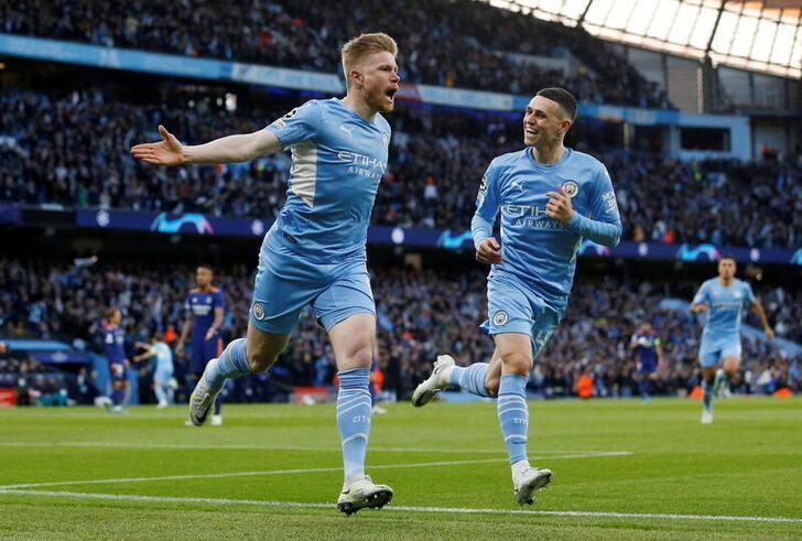 Kevin De Bruyne et Phil Foden célèbrent le premier but de Man City contre le Real Madrid.